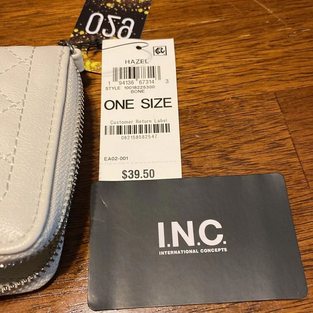 INC Wristlet NWT. Off WHITE